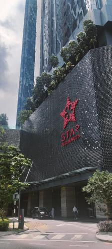 a star sign on the side of a building at Star Residence Suite KLCC in Kuala Lumpur