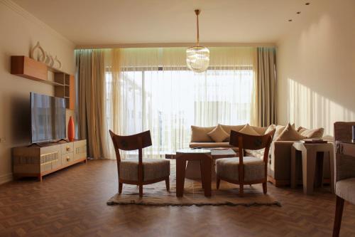 TV a/nebo společenská místnost v ubytování Sahara at Lake View Residence