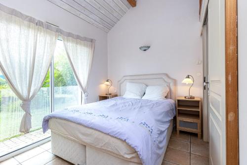 Кровать или кровати в номере Villa Julien