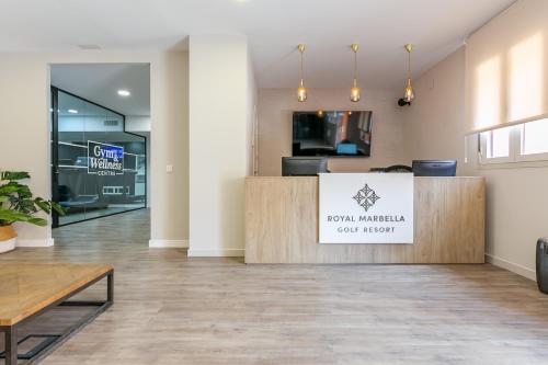 a lobby with a sign that reads court miami court room at Royal Marbella Golf Resort in Estepona