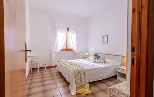 Ένα ή περισσότερα κρεβάτια σε δωμάτιο στο Villa Vanna Bilo B - bilocale