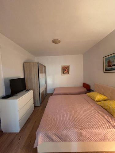Apartment Boevi tesisinde bir odada yatak veya yataklar