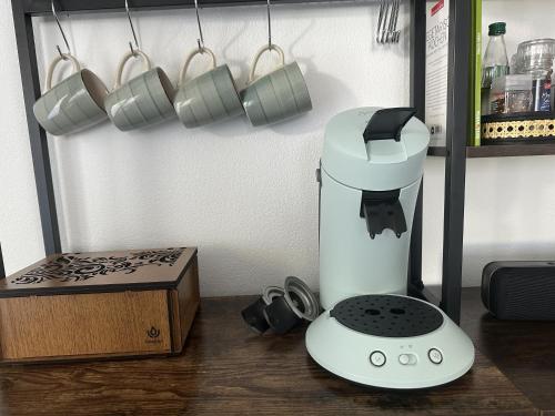 a blender sitting on a counter next to a box at Melanies Apartment in Burgsinn