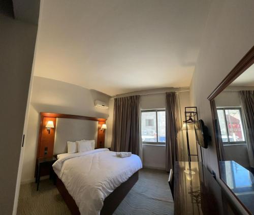 Postel nebo postele na pokoji v ubytování Pasha Boutique Hotel