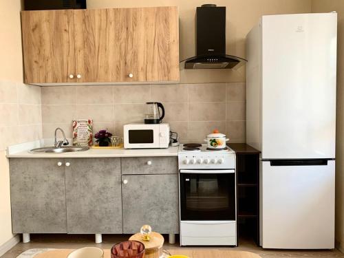 Gallery image of Уютные апартаменты на Туране возле Кардиоцентра in Taldykolʼ