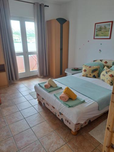Posteľ alebo postele v izbe v ubytovaní Apartments Meerzeit