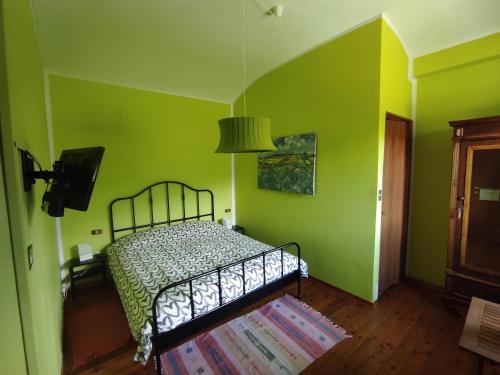 Postel nebo postele na pokoji v ubytování B&B Rocciamelone