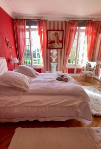 Postel nebo postele na pokoji v ubytování La chambre des écureuils