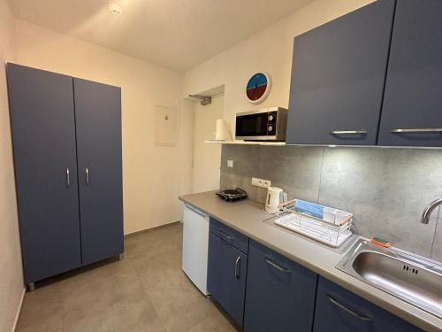 Cybulskiego Guest Roomsにあるキッチンまたは簡易キッチン