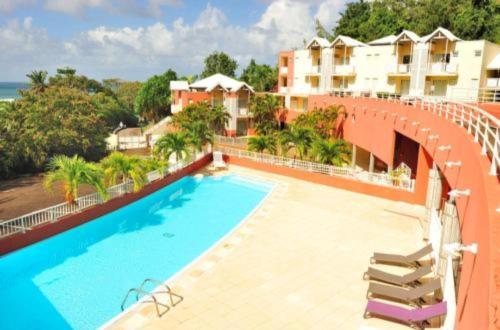 Bazén v ubytování Appartement vue mer, résidence avec piscine à Tartane nebo v jeho okolí