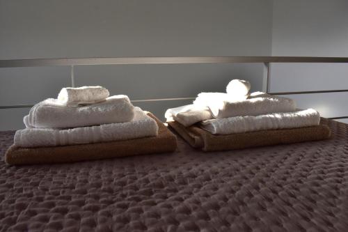 Ένα ή περισσότερα κρεβάτια σε δωμάτιο στο Konan's cosy condo