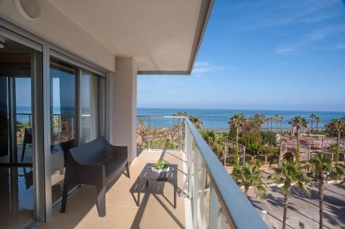 a balcony with a view of the ocean at Holiday Deluxe Apartment Miramar Magic World in Oropesa del Mar