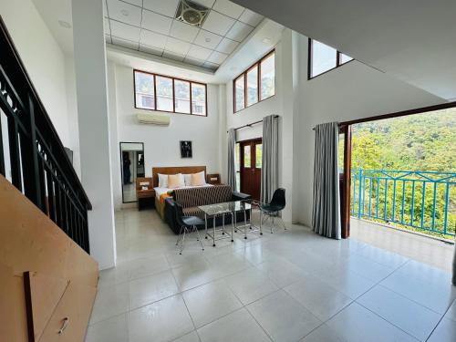 Ένα ή περισσότερα κρεβάτια σε δωμάτιο στο Moi Ella by DBI