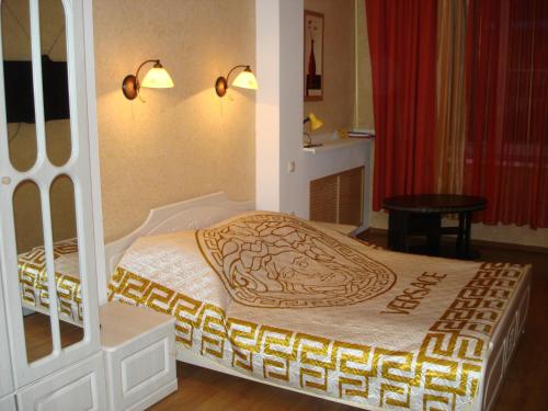En eller flere senger på et rom på Severniy Hotel
