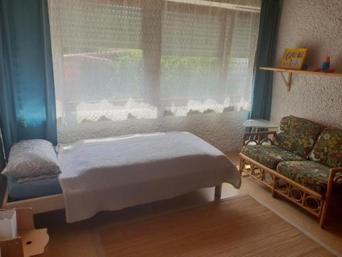 Un pat sau paturi într-o cameră la Gemütliches Haus Legoland Nah