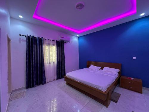 Giường trong phòng chung tại Villa Hortensia F4 RDC