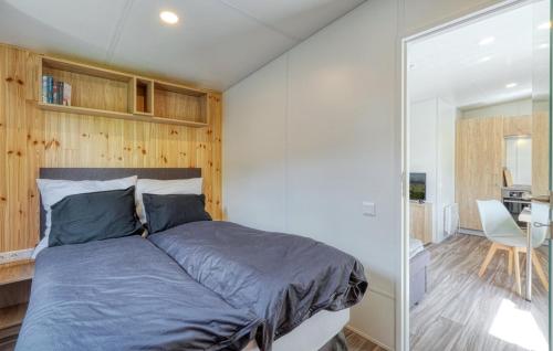 Postel nebo postele na pokoji v ubytování Tiny House Wemding