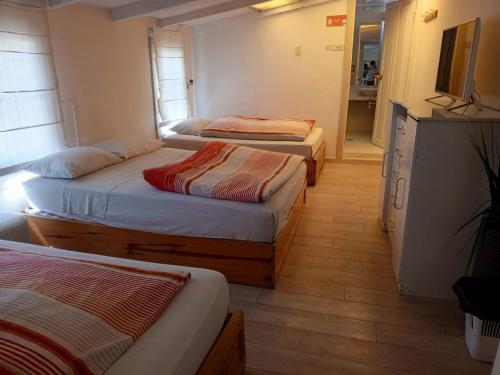 Atatau Hostelにあるベッド