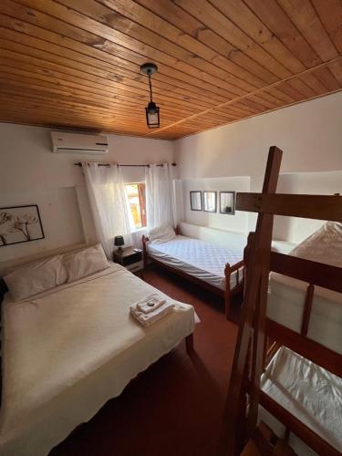Ένα ή περισσότερα κρεβάτια σε δωμάτιο στο Casa da Jana