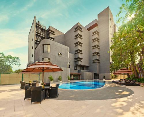 a rendering of a hotel with a swimming pool at Vivanta Vadodara in Vadodara