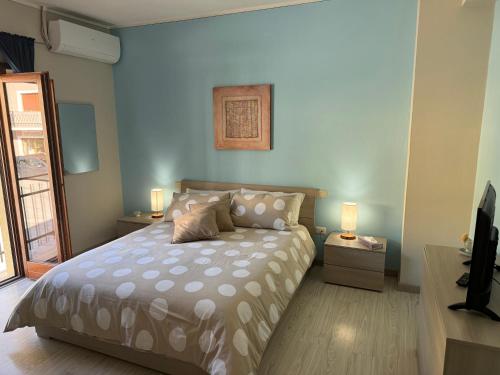Postel nebo postele na pokoji v ubytování B&B Fiume