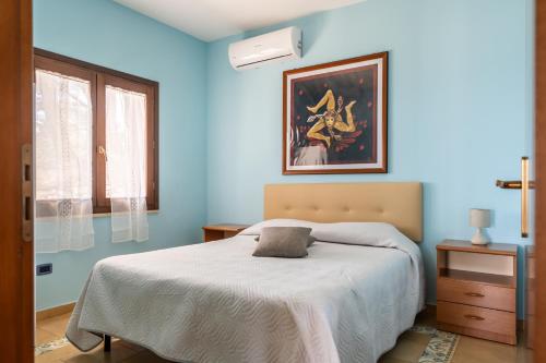 Giường trong phòng chung tại Villa Rosa sul mare