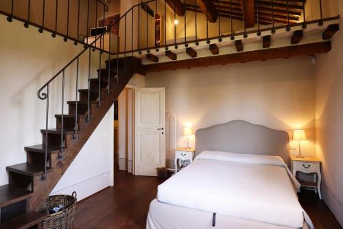 Postel nebo postele na pokoji v ubytování Podere I Poggi by Great Stays