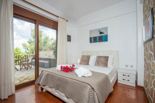 A bed or beds in a room at The Stone House