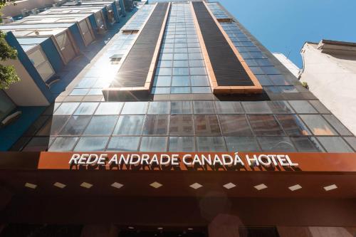 a rendering of the facade of the red appendage canada hotel at Rede Andrade Canada in Rio de Janeiro
