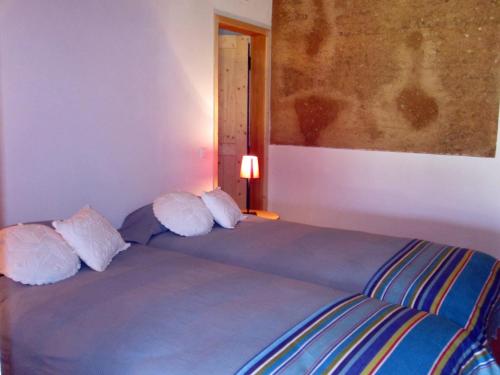 Postel nebo postele na pokoji v ubytování Herdade Do Azinhal