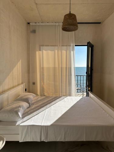 Postel nebo postele na pokoji v ubytování Grigoleti Dream House