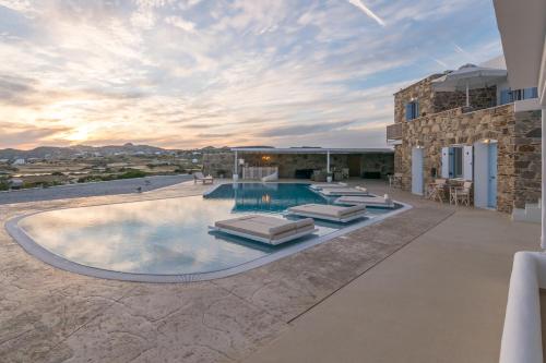 an image of a villa with a swimming pool at Blu Suites and Studios in Adamas