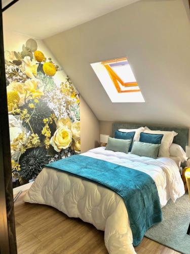 Кровать или кровати в номере Le Clos des Roses