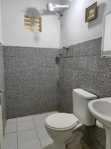 Ванна кімната в Pousada Carambola