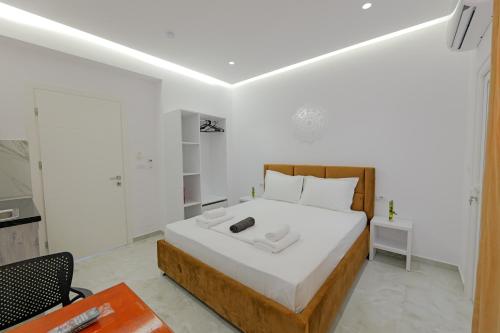 Ένα ή περισσότερα κρεβάτια σε δωμάτιο στο Central Garden Residence Sofia - Free Parking