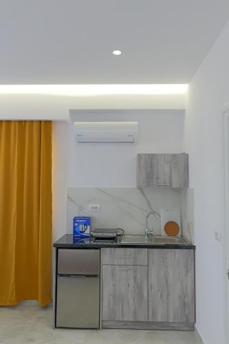 Η κουζίνα ή μικρή κουζίνα στο Central Garden Residence Sofia - Free Parking