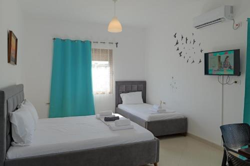 Ένα ή περισσότερα κρεβάτια σε δωμάτιο στο Central Garden Residence Sofia - Free Parking