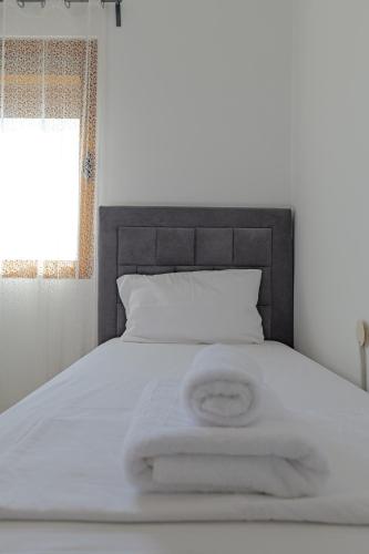 Ένα ή περισσότερα κρεβάτια σε δωμάτιο στο Central Garden Residence Sofia - Free Parking