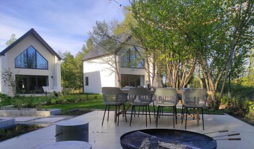 Źródlana Apartamenty - całoroczne domy na wyłączność