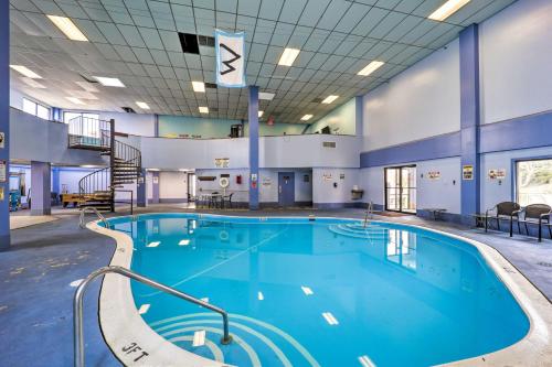 a large swimming pool in a large building at Furnished Deck and Resort Perks Beech Mtn Retreat! in Beech Mountain