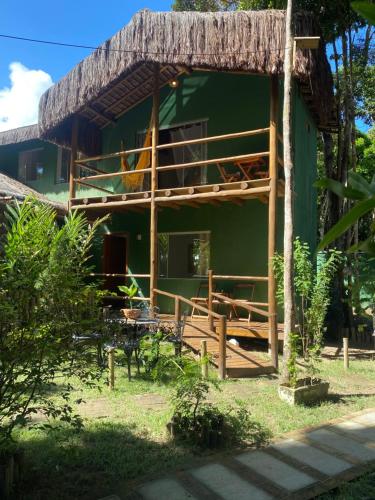 Taman di luar Pousada Casa de Sapê