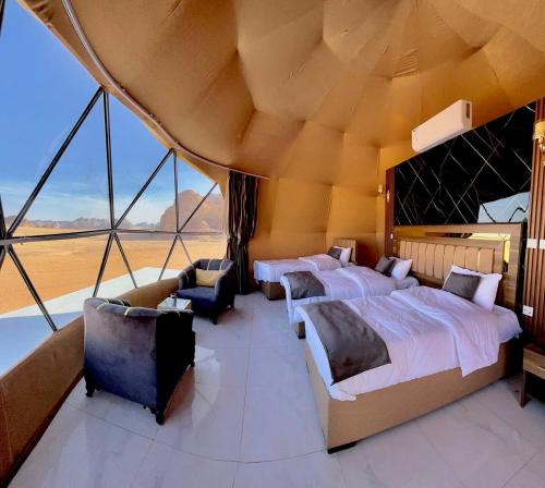 Katil atau katil-katil dalam bilik di SARAB Luxury Camp