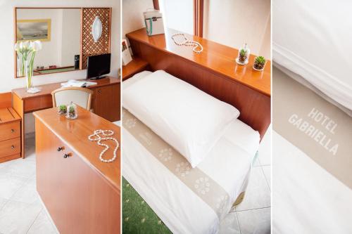Postel nebo postele na pokoji v ubytování Hotel Gabriella