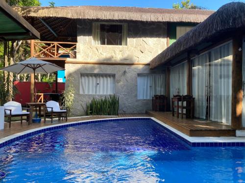 Kolam renang di atau dekat dengan Pousada Casa de Sapê