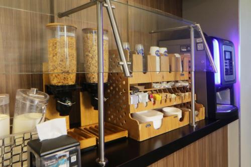 a counter with some food inside of a restaurant at City Express by Marriott Rosarito in Rosarito