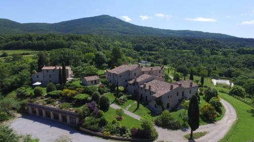 an aerial view of a mansion in the mountains at Borgo Fastelli in Sarteano