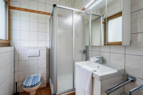 Ett badrum på Apartment zur Therme St.Kathrein