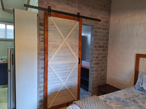 Ein Bett oder Betten in einem Zimmer der Unterkunft 1@Kruger Unit 3