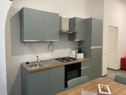 Kuchyň nebo kuchyňský kout v ubytování Casa Gemm