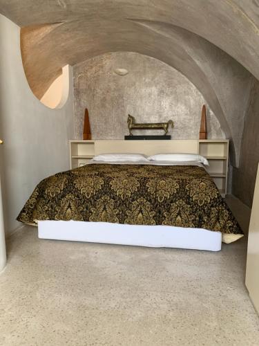 Postel nebo postele na pokoji v ubytování Palazzo Salapolis - Luxury Apartments